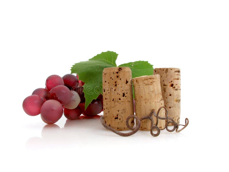 Three corks with grapes