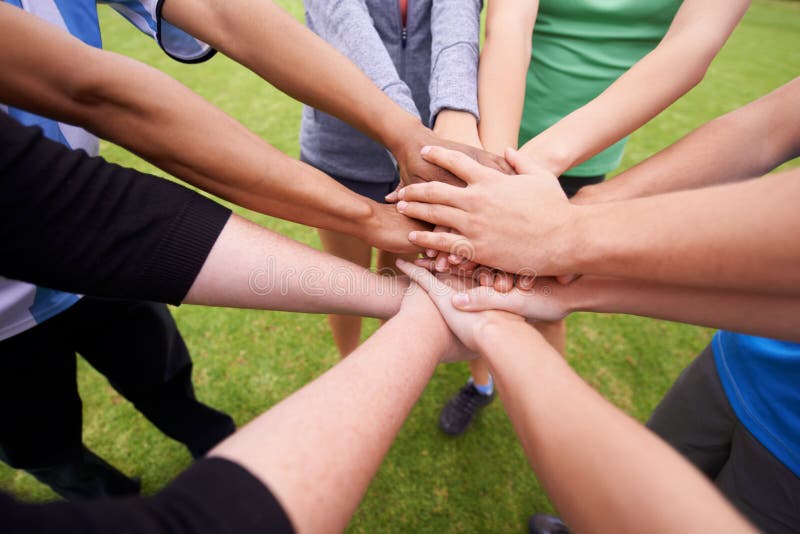 On Three. Cropped Shot of a Sports Team with Their Hands in a Huddle