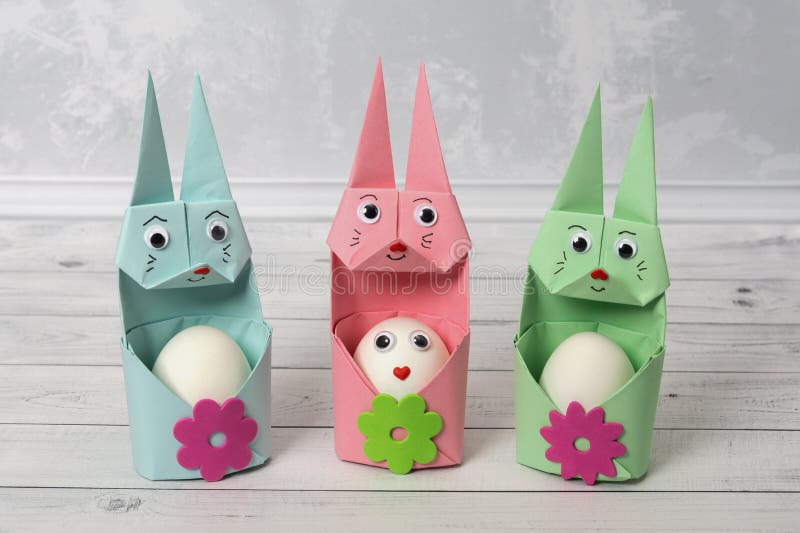 Three Cute Egg Holders in the Shape of Easter Bunnies. Rabbit Made of