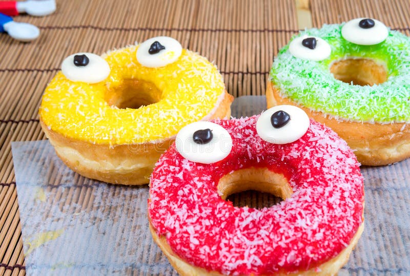 Three Donut of Colorful Donuts Stock Image - Image of cake, colorful