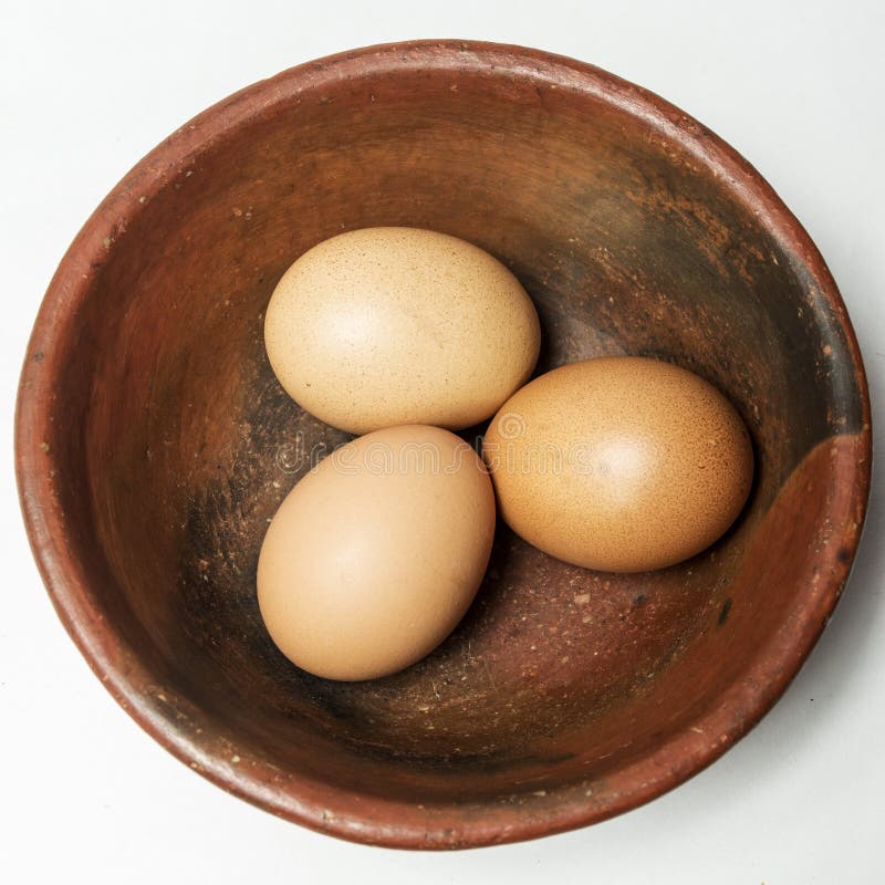 Three eggs in a bowl royalty free stock photography Three eggs in a bowl royalty free stock photography