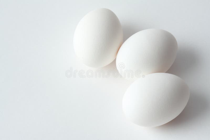 Three eggs on white