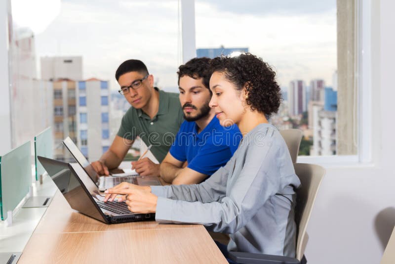Three Employees Talking about Project. Stock Photo Image of urban