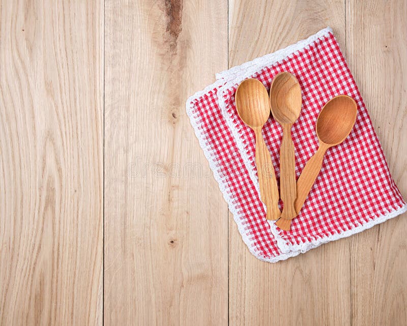 Three Empty Wooden Spoons on a Red Kitchen Towel Stock Image Image of