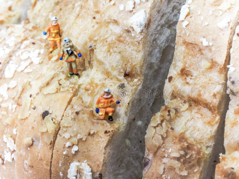 Three explorers are climbing a mountain stock photo