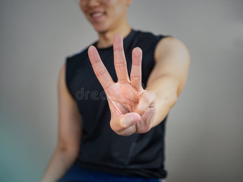 Three Fingers Gesture by Man Wearing Sport Wear Stock Image Image of