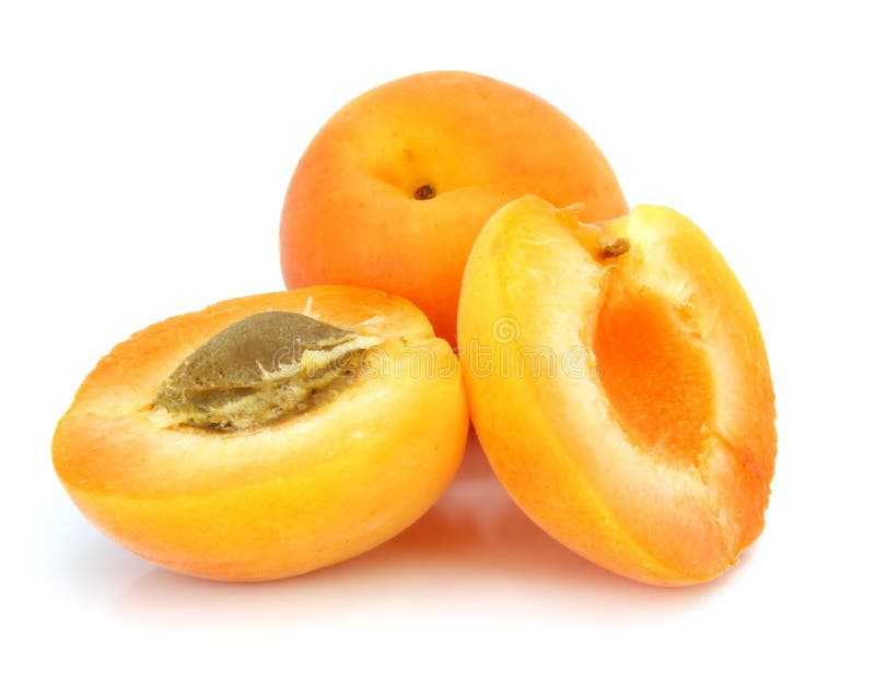 Three fresh apricot fruits