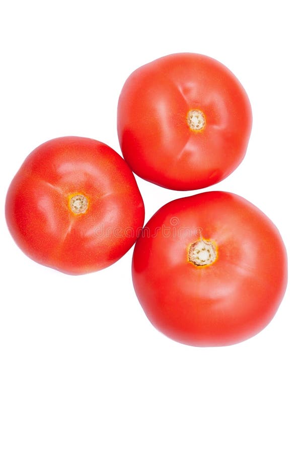 Three fresh healthy tomatoes isolated over white background