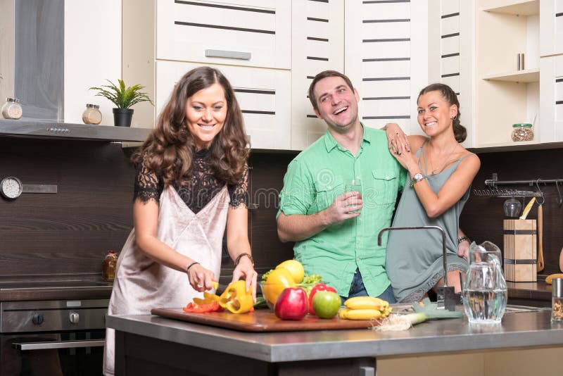 Three Friends Having Fun in the Kitchen Stock Photo Image of lunch
