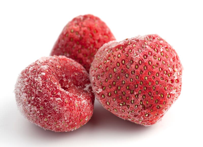 Three Frozen Strawberries stock photo. Image of food 23419196