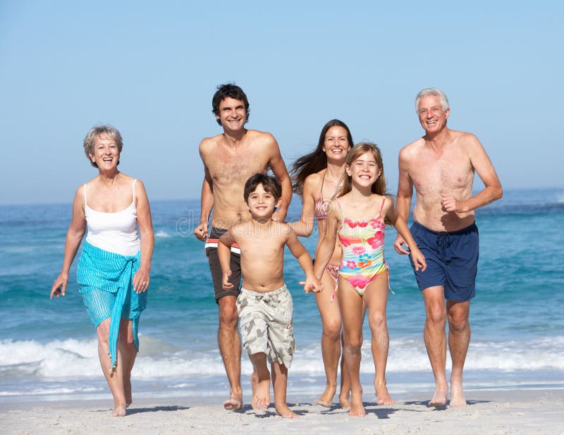 Three Generation Family On Holiday On Beach stock photography Three Generation Family On Holiday On Beach stock photography