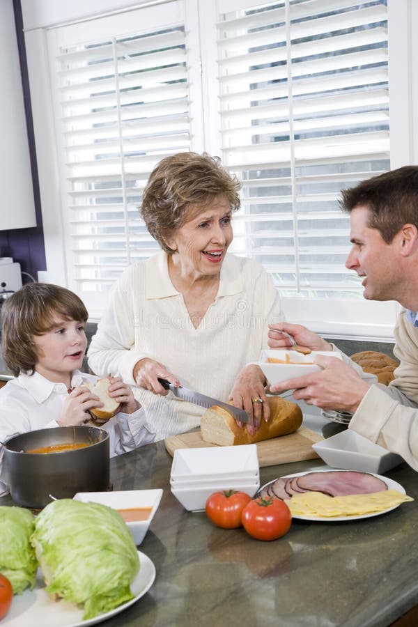 https://thumbs.dreamstime.com/b/three-generation-family-kitchen-eating-lunch-14552317.jpg
