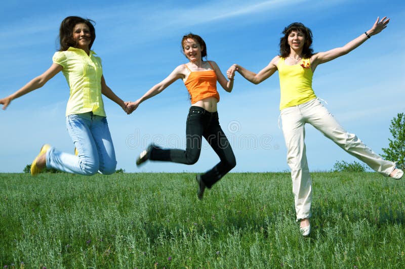Three Girlfriend Jump In Green Field Picture. Image 5958181