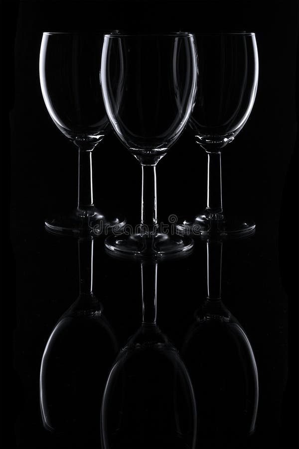 Three glasses on black