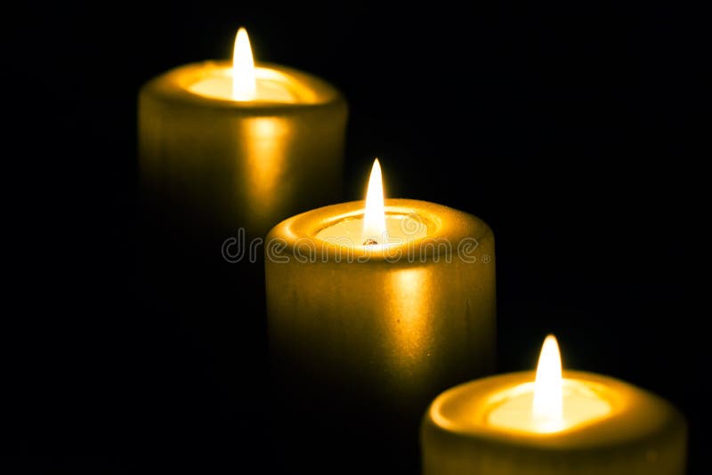 Three golden candles