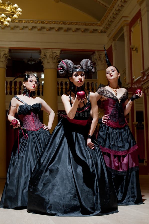 Three gothic girls with horns