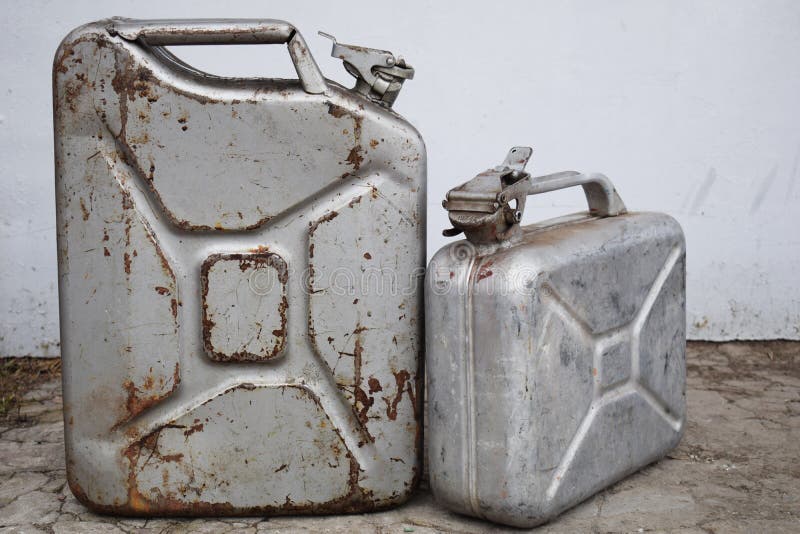 Two gray cans with gasoline or diesel, metal barrel royalty free stock photo Two gray cans with gasoline or diesel, metal barrel royalty free stock photo