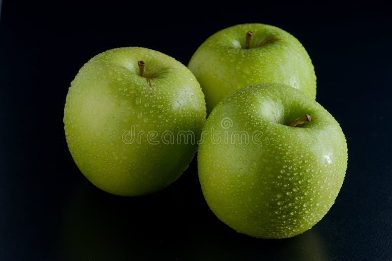 Three green apples