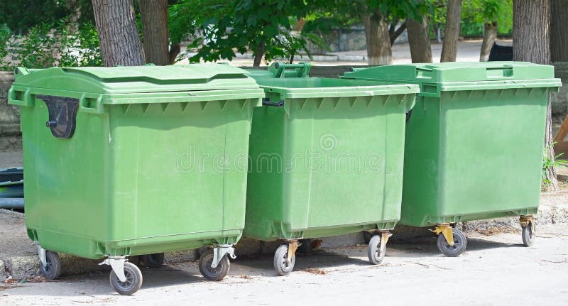 https://thumbs.dreamstime.com/b/three-green-garbage-containers-city-parks-155020220.jpg