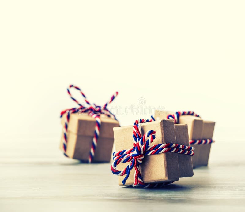 Three handmade gift boxes in shiny colour background. royalty free stock photos Three handmade gift boxes in shiny colour background. royalty free stock photos
