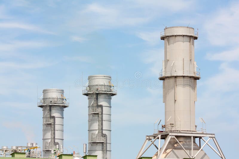 Three industrial chimneys