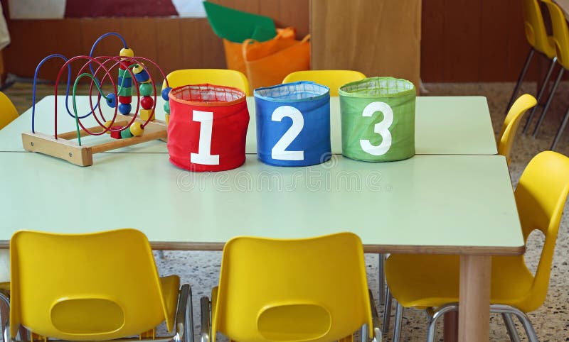 Three jar with big writing 1 2 3 into a kindergarten classroom w royalty free stock images Three jar with big writing 1 2 3 into a kindergarten classroom w royalty free stock images