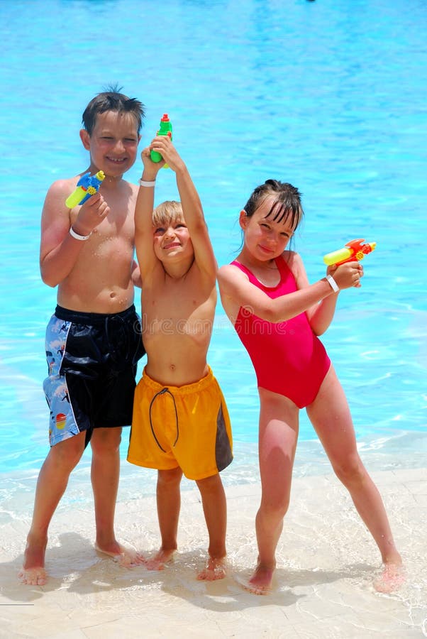 Three Kids with Squirt Guns