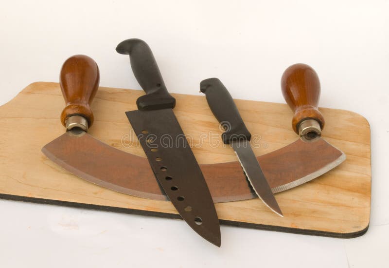 Three Knives on a Cutting Board Stock Photo Image of wood, handle
