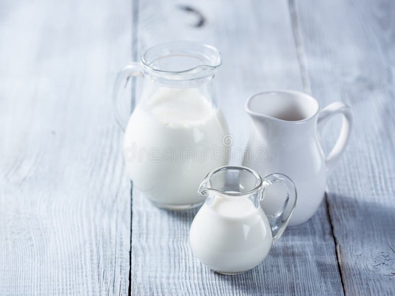 Three milk jars stock image
