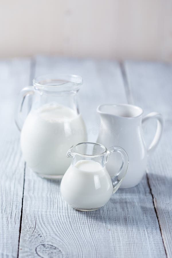 Three milk jars royalty free stock image