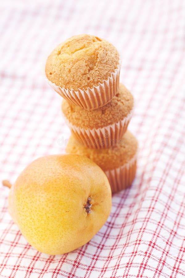 Three muffins and pear