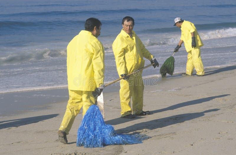 Workers Cleaning Up Oil Spill On Beach Editorial Image Image of