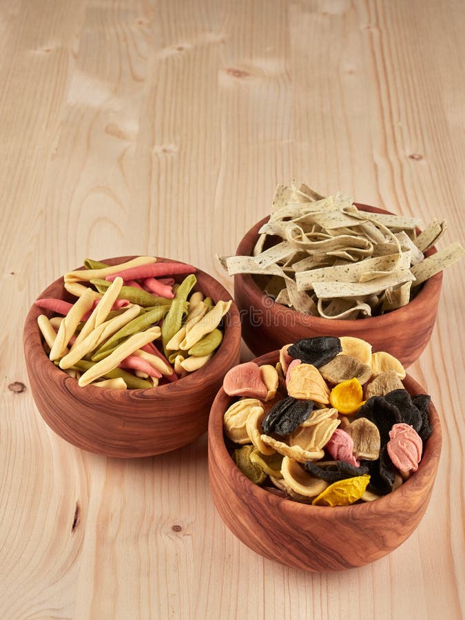 Colorful orechiette, fusilli and tagliatelle pasta