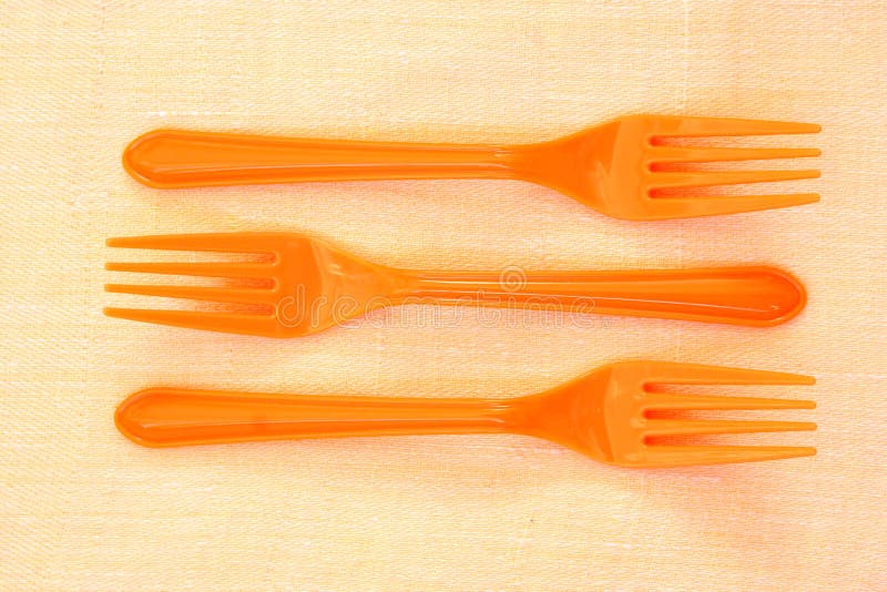Three orange forks stock image. Image of food, kitchen 12641617