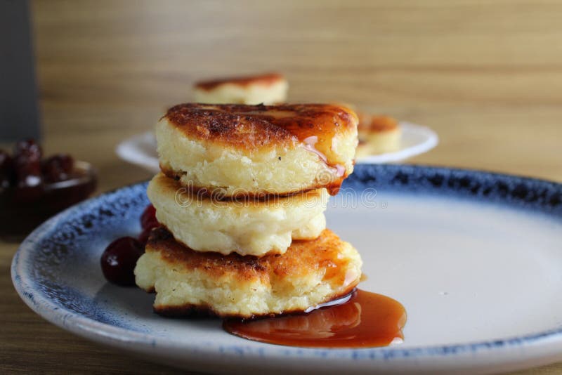 Three Pancake Cheesecakes Lie A Stack Of Slides On Top Of Each Other On