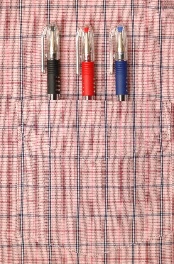 Three pens in shirt pocket stock image. Image of black 9347027