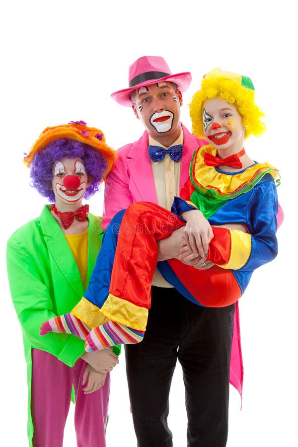 Three People Dressed Up As Colorful Funny Clowns Stock Photo - Image of  three, children: 18553334