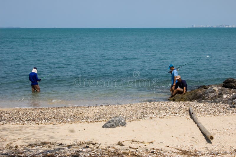 Three people fishing