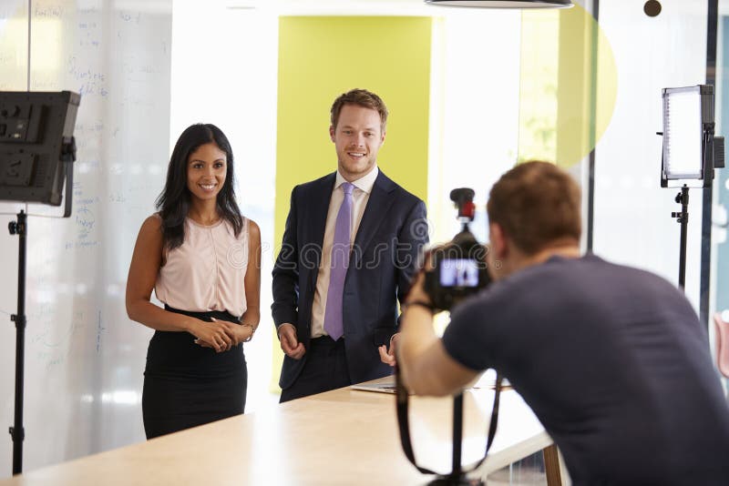 Three people making a corporate demonstration video stock image