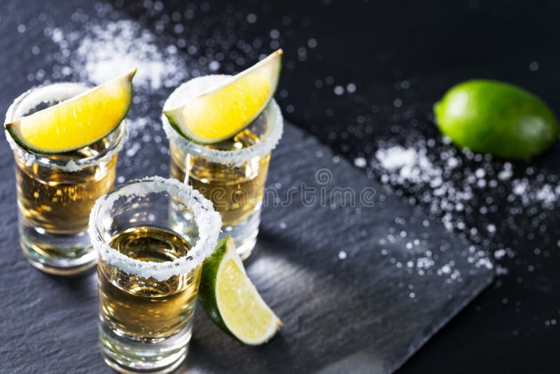 Three Piles of Mexican Tequila with Lime and Salt Stock Image - Image ...