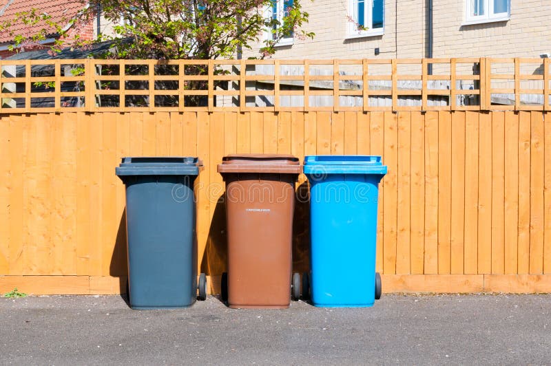 Three Plastic Waste Bins Outside a House Stock Photo Image of brown