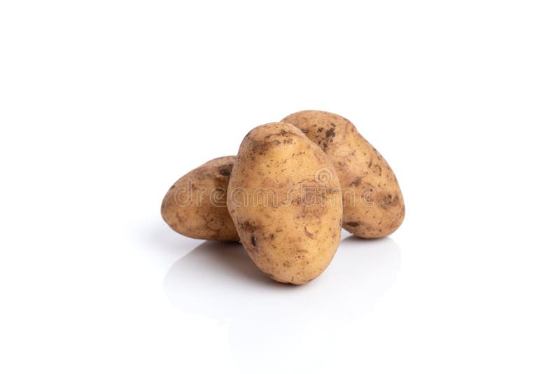 Three Potatoes Isolated On A White Background. Root Vegetable. Stock
