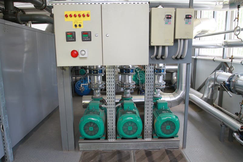 Three powerful pumps with a control panel stock photos