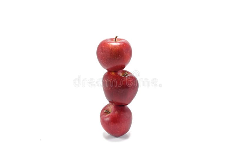 Three red apples stacked on the top of each other, isolated on white background