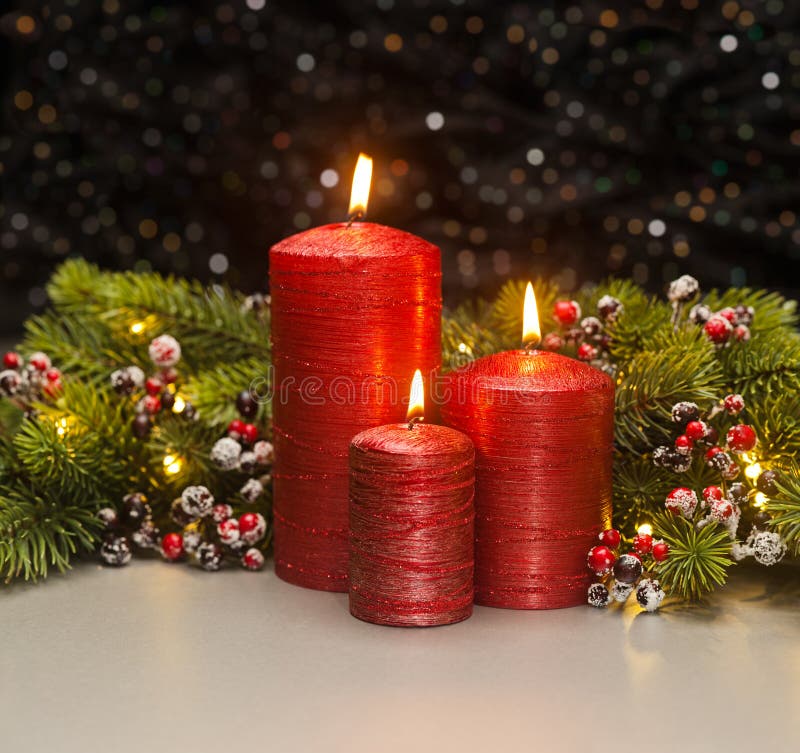 Red Burning Advent Christmas Candles With The Berries Wreath On A Red