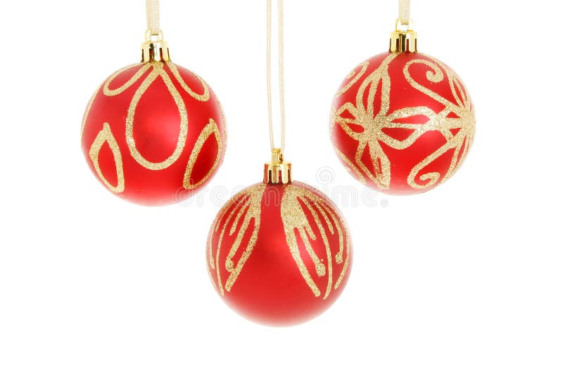 Three red and gold Christmas baubles