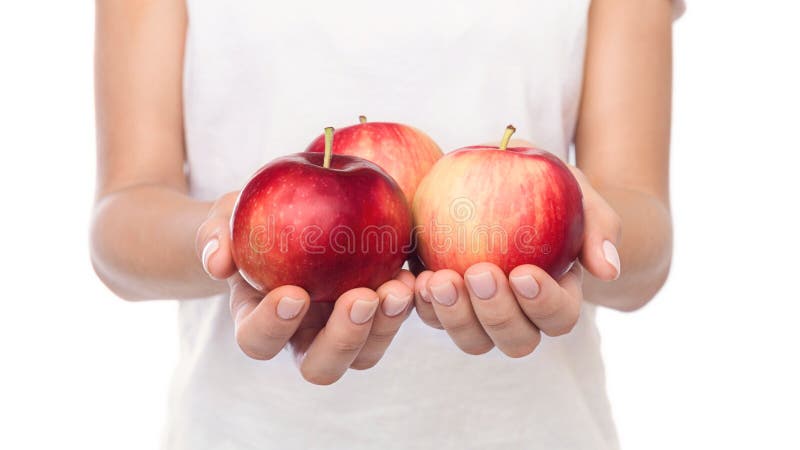Three ripe apples in female hands over white background royalty free stock photos Three ripe apples in female hands over white background royalty free stock photos