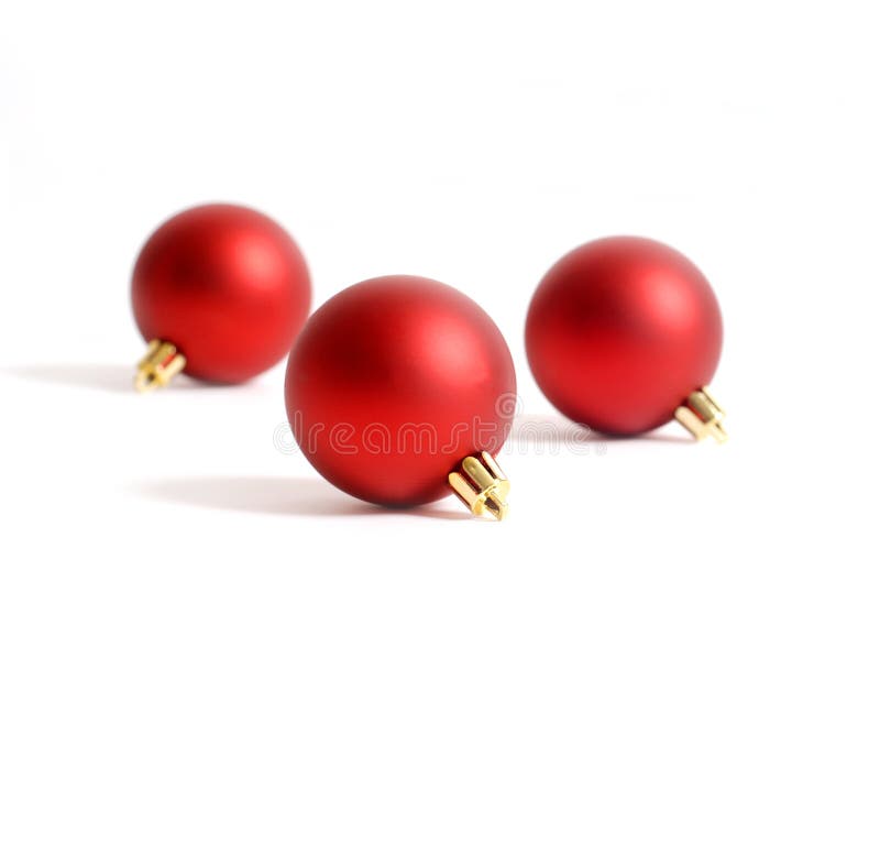 Three round red Christmas ornaments