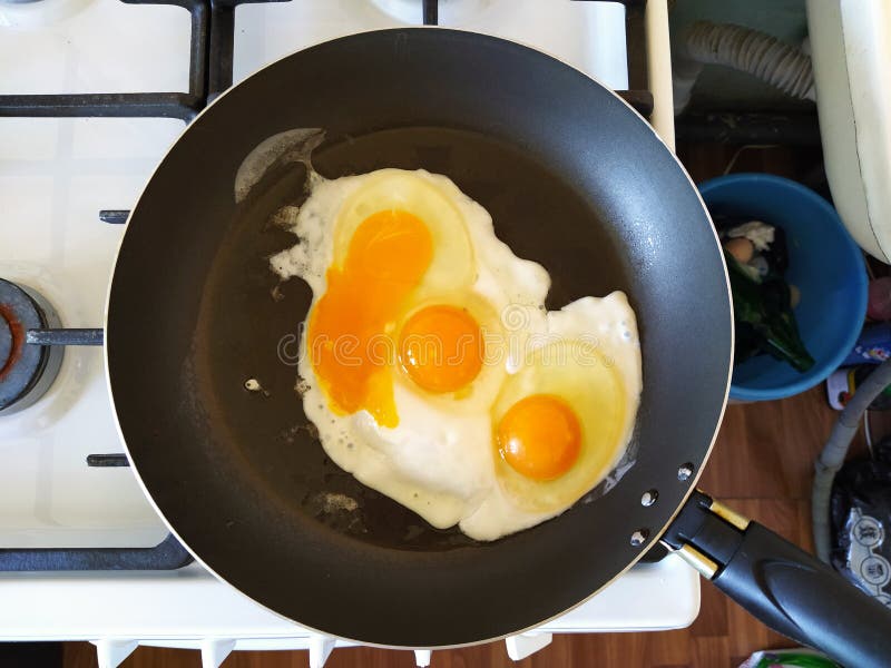 Three Scrambled Eggs Fried in a Pan Stock Photo Image of isolated