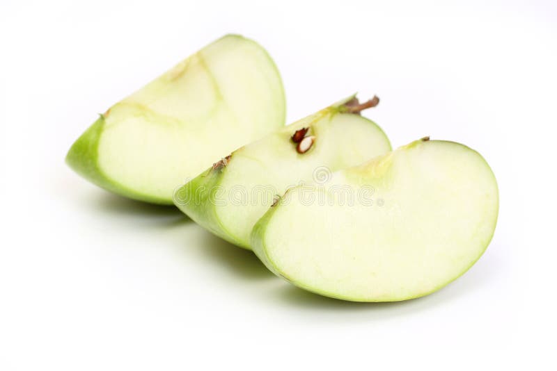 Three slice a green apple